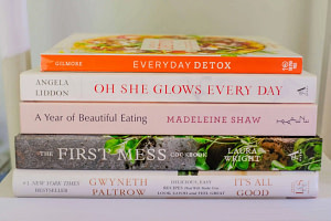 A stack of four books on cooking recipes